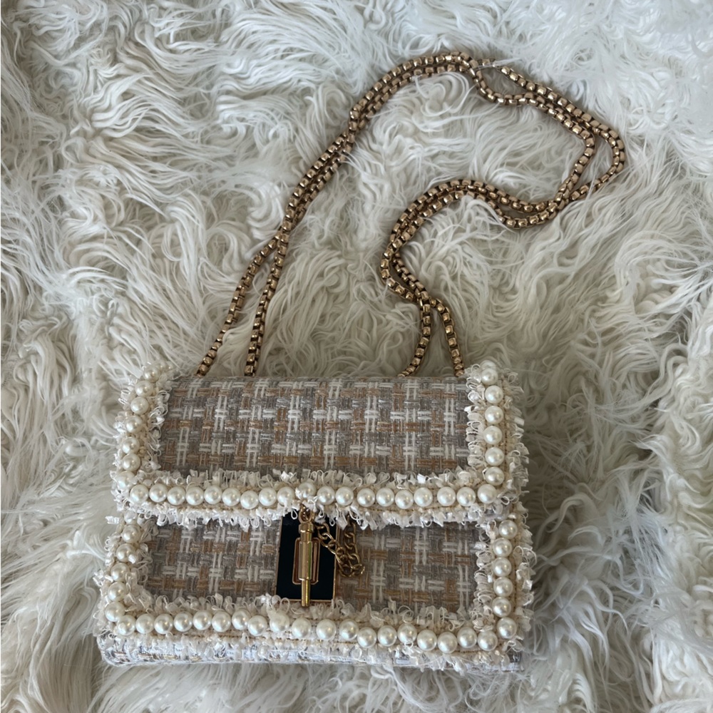 Adorable tweed mini purse with pearl and gold details!